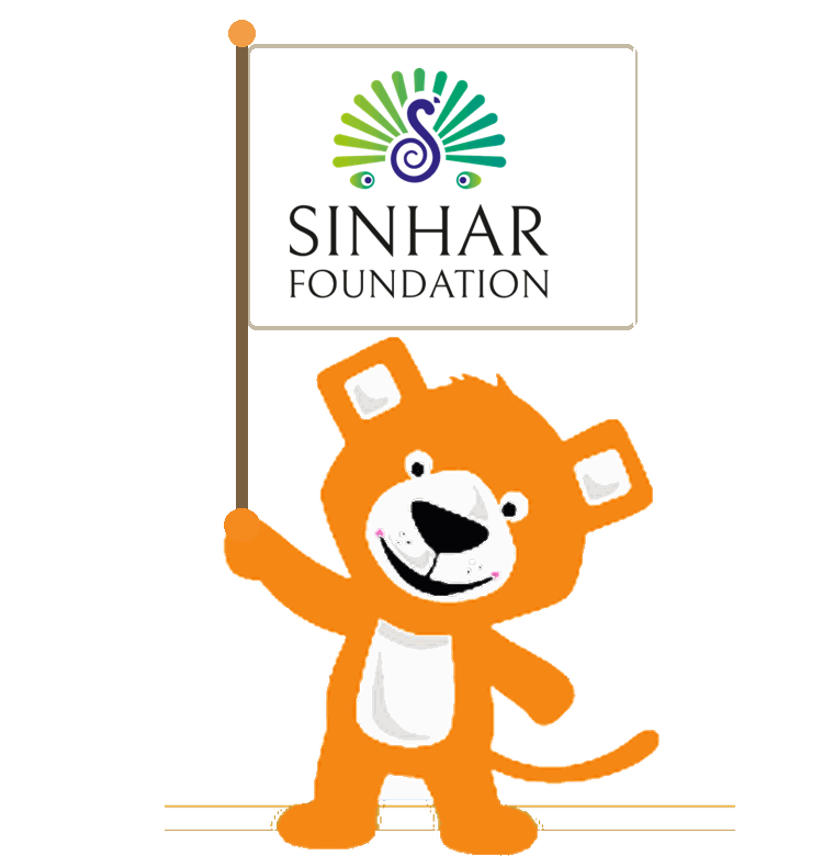 Leo holding up the Sinhar Foundation flag